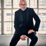 Brian Simpson will be performing at DEN's summer concert series