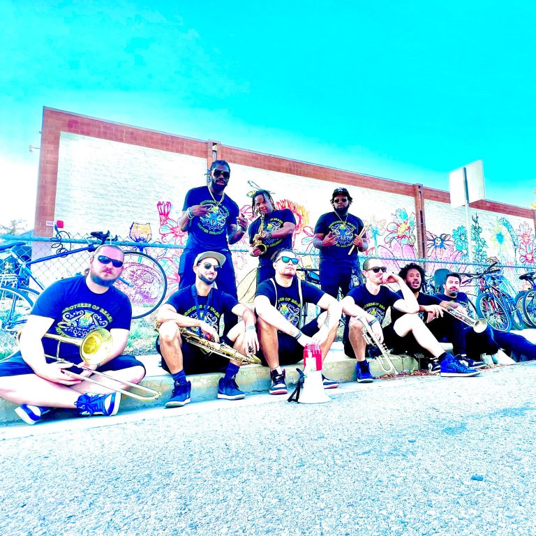 Brothers of Brass will be performing on DEN's Plaza for Juneteenth