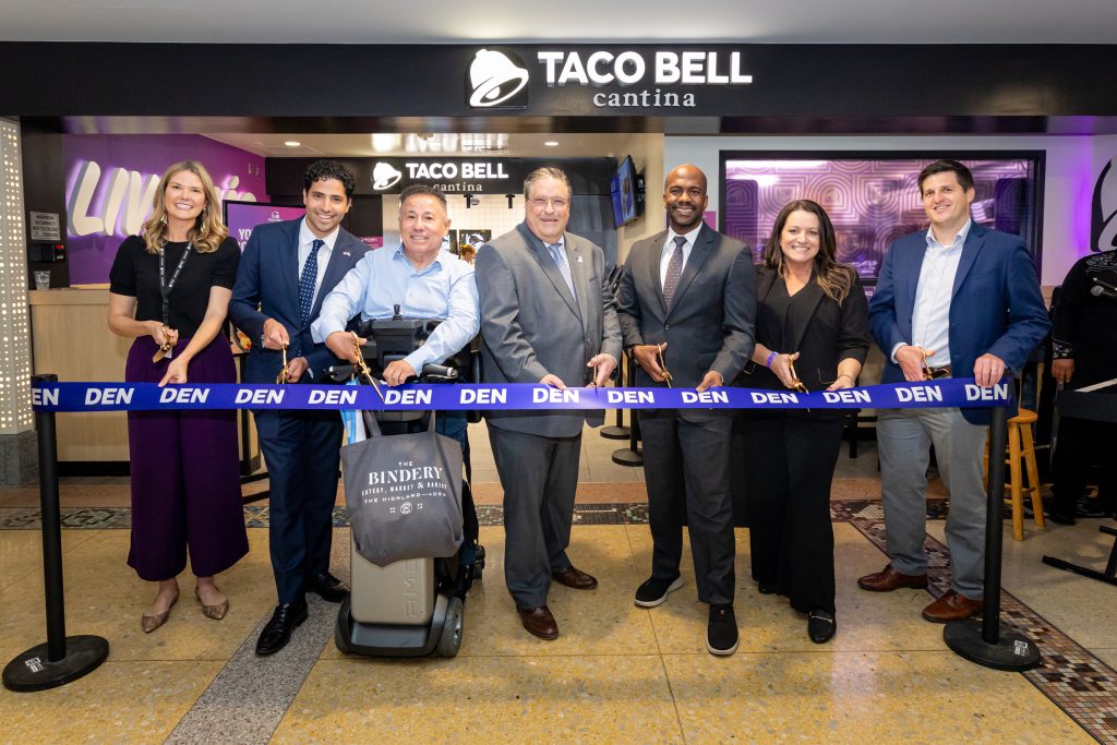 DEN and Mission Yogurt Inc. celebrated the grand opening of Taco Bell Cantina on Concourse A, near Gate A47. From L-R: Kathleen Schafer, Rep. Manny Rutinel, Roderick Tafoya, Gabriel Benvenuto, Chris Herndon, Pam Dechant and Branden Sowers.