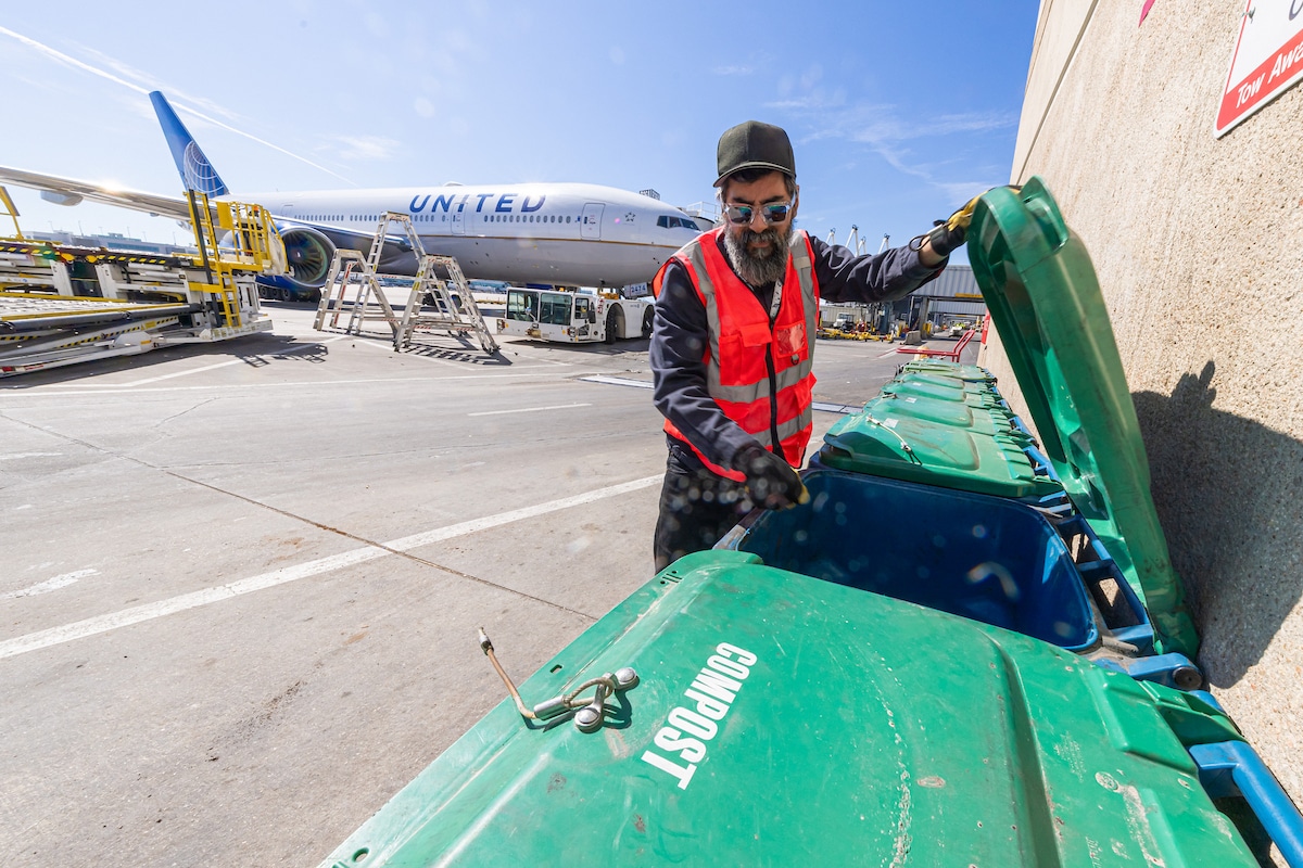 DEN staff check recycling containers
