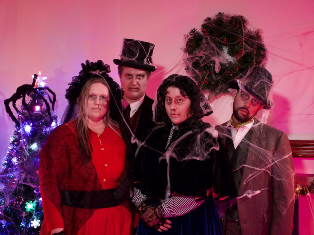 The Scarolers, a quartet of singing zombies, will be entertaining travelers on center core, A Gates