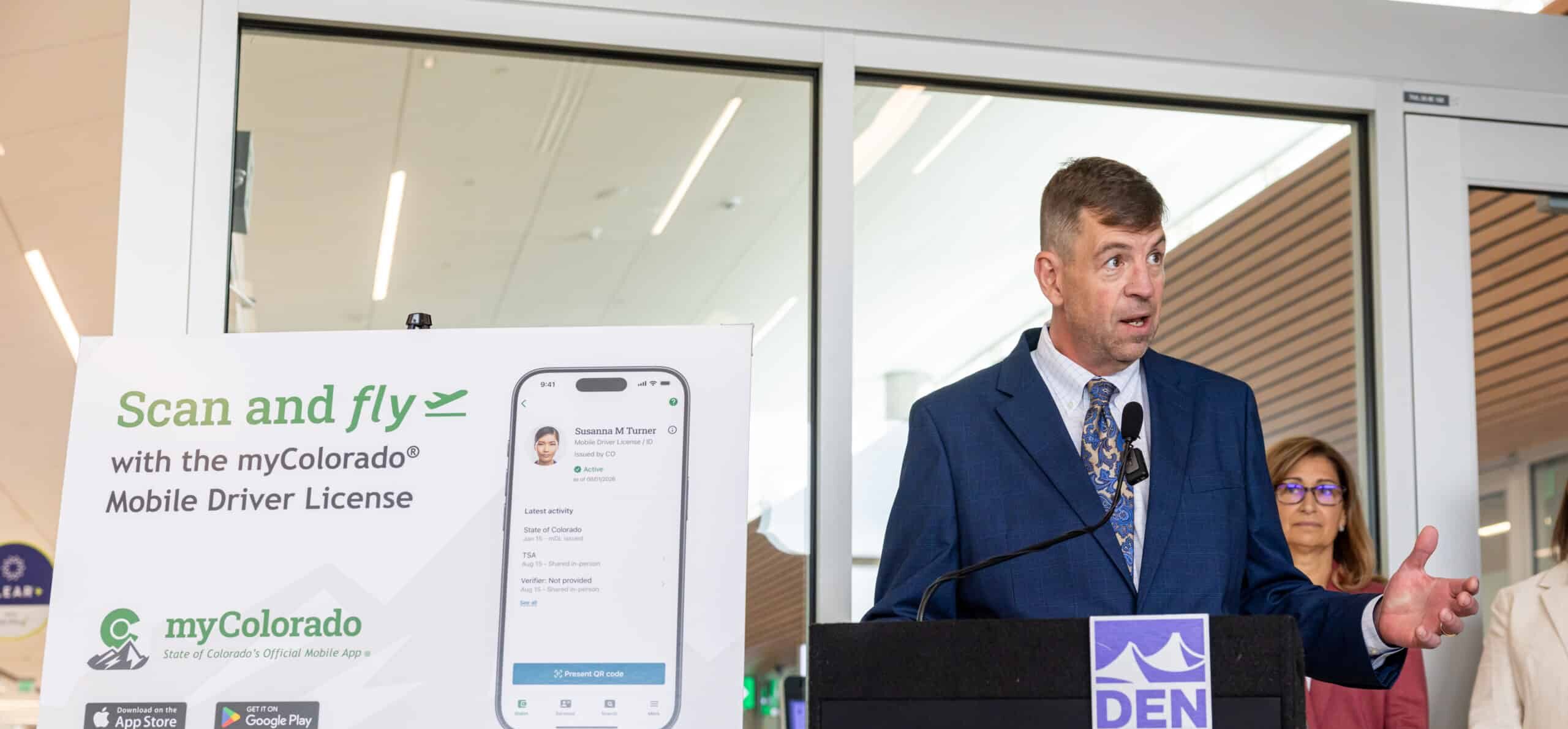 EN's interim CEO Dave LaPorte helps Governor Polis launch the Colorado mDL at DEN. 