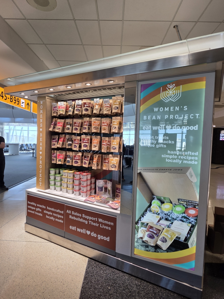 Women’s Bean Project kiosk is on B Gates